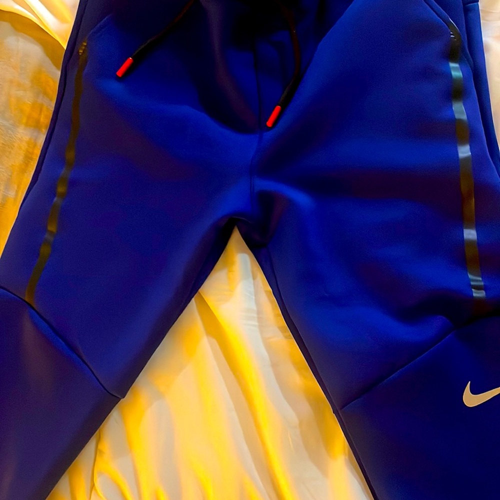 Nike sweater pants blue and red